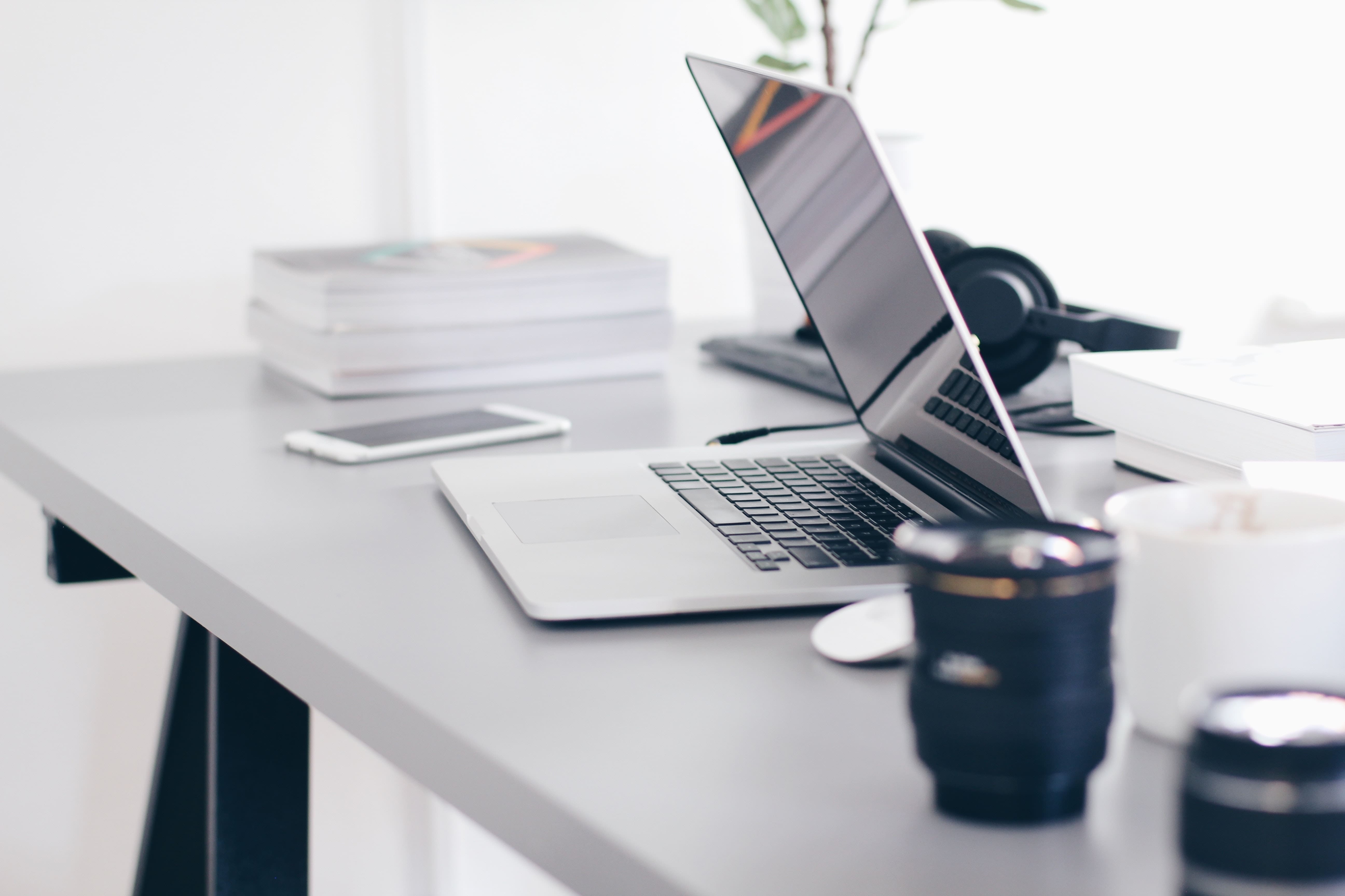 Laptop on desk with no worker present