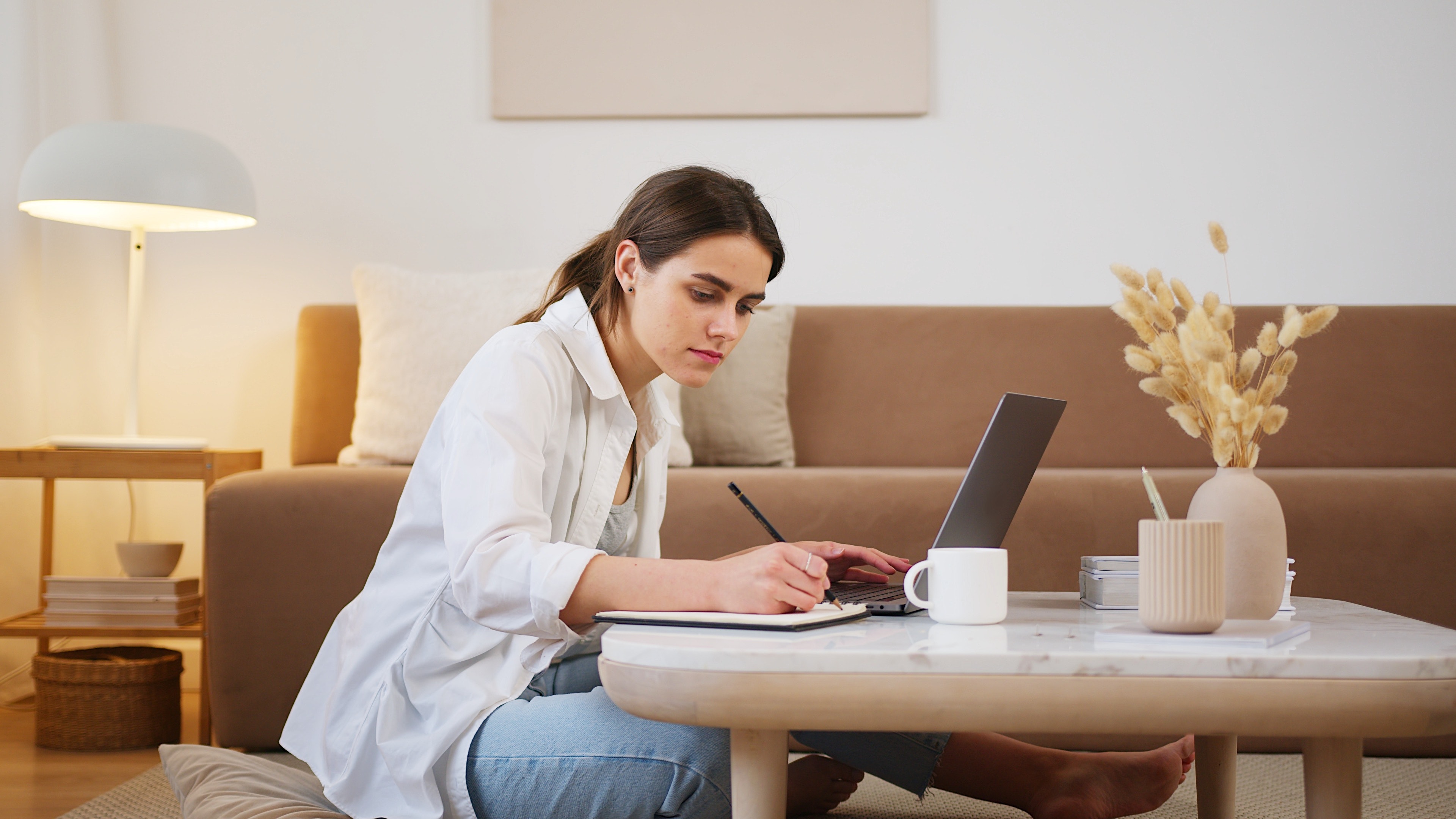 Woman working from home and training with Total CSR in her living room
