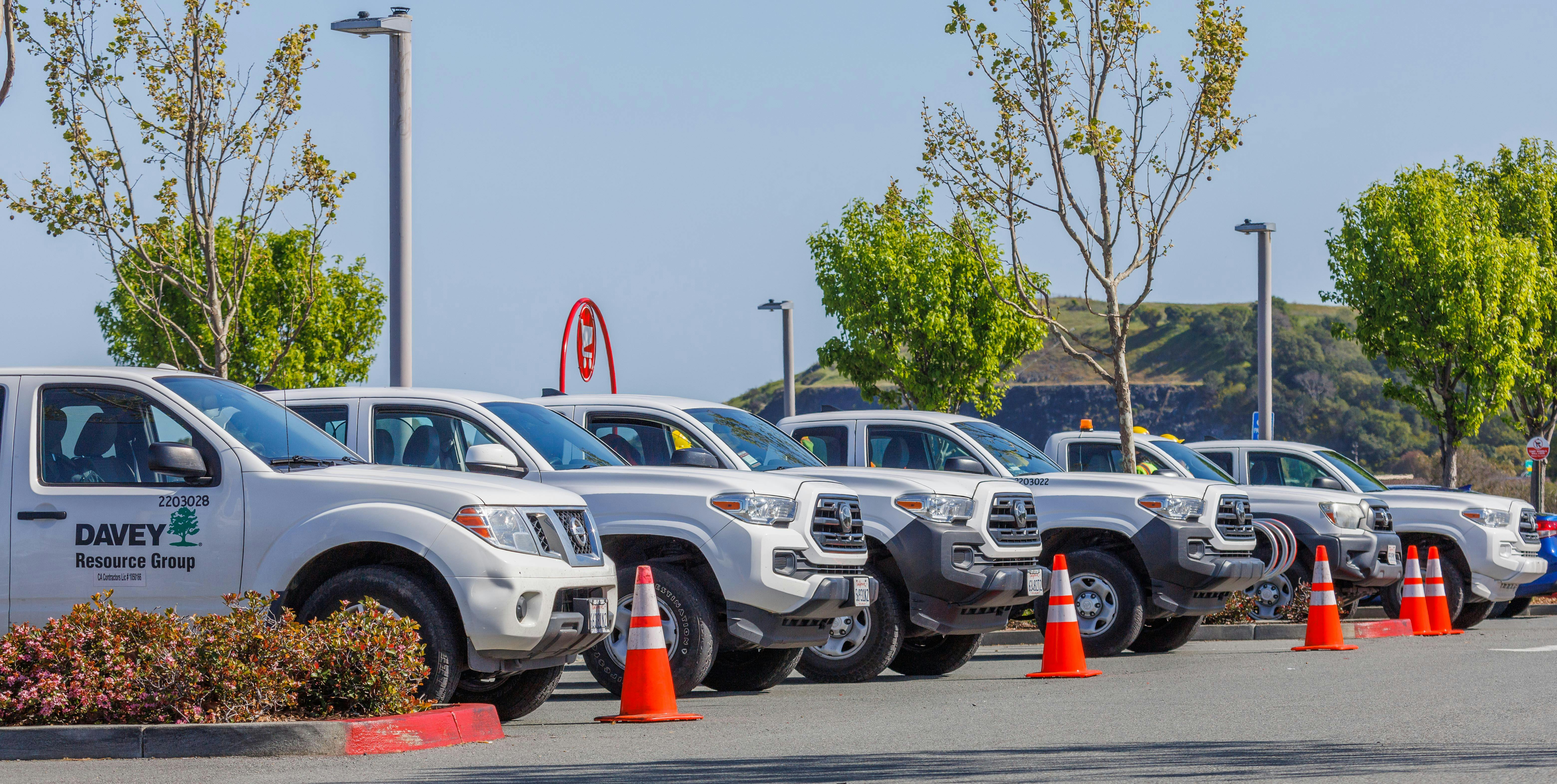 Vehicles insured under a business auto policy, demonstrating the importance of understanding Auto Symbol 7 as explained in the article.