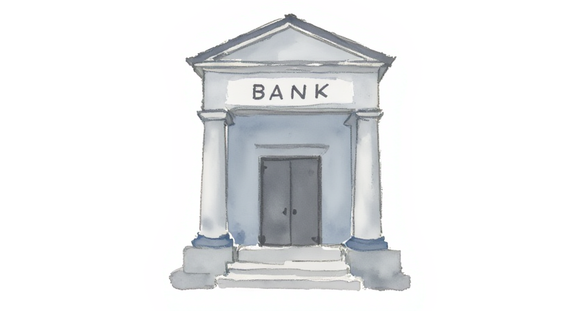 Lenders loss payable vs loss payee shown by the front entrance of a bank.