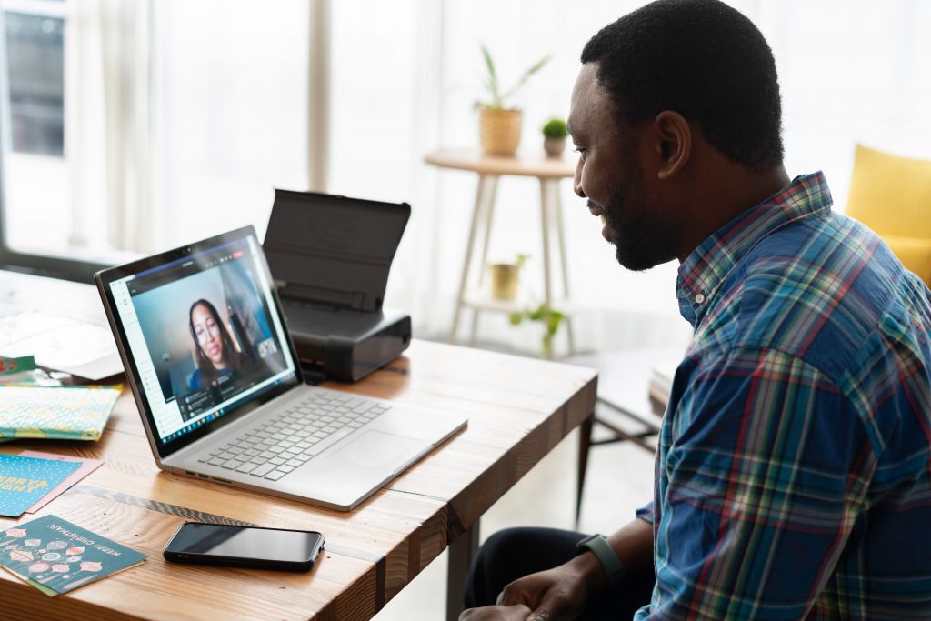 Manager holding zoom meeting with remote worker